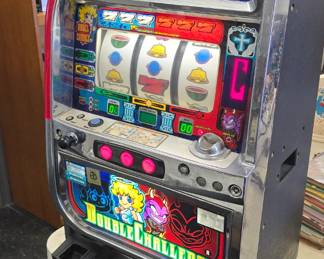Double Challenge slot machine/skill game working with key and tokens.