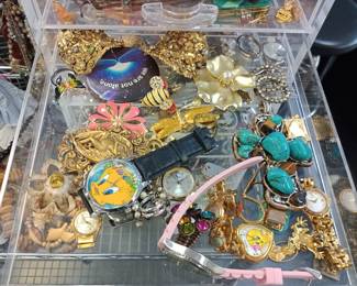 Tons of costume jewelry, rings, bracelets, earrings, and more 