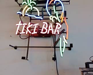 Neon tiki Bar working sign 