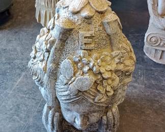 One bad to the bone large concrete North, South, East, West statue 