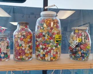 very large jars full of all kinds of stuff lots of dice 