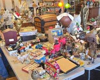 took some photos of just everything because it looks awesome in here don't miss this sale. and look here I got John acting like he is working!