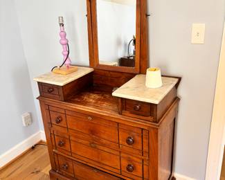 Antique vanity chest of drawers with marble side tables and mirror 