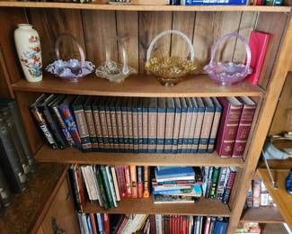 Glass baskets, and books, and an encyclopedia set too