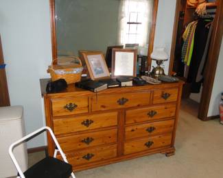 A beautiful solid wood dresser and mirror combination