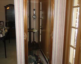 Large, ornate floor length mirror