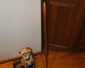 Oh, that cane is simply amazing.  It's not only a walking stick, but hidden inside the top, is a flask, that holds, "liquid".