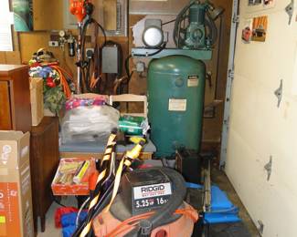 We have some things to move around, but more importantly that is an industrial compressor back there, and yes it comes with all the hoses and connections too