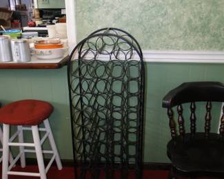 You can store at least a weeks worth of wine in this wine holder.  Which is actually made of wrought iron