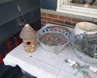 Bird house and plenty of plant holders too