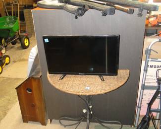 Tiny TV and half moon table, and yes we moved to the garage now