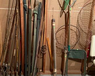 Lots of fishing poles and equipment