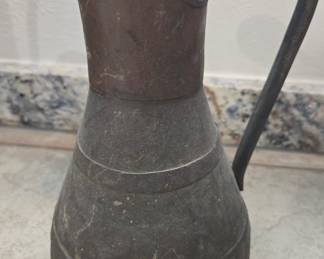 brass pitcher