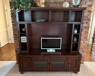 ENTERTAINMENT CENTER. $135. 