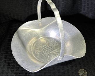 Hand forged aluminum basket 