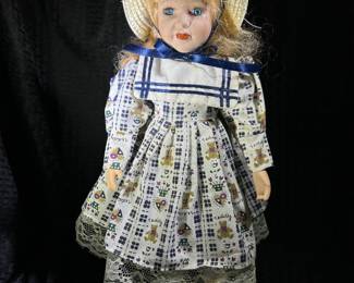 Porcelain collector’s doll