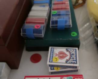 more  poker  chips  and  cards