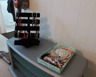 costume  jewelry  necklaces   and  bracelets,  television  stand