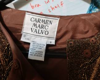 name  on  beaded two  piece  outfit