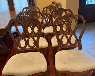 DINING TABLE- INCLUDES LEAF WITH 8 CHAIRS (2 CAPTAIN'S CHAIRS) Chair Cushions do you to be recovered. Tabletop on one side could be refinished. - Available for presale 