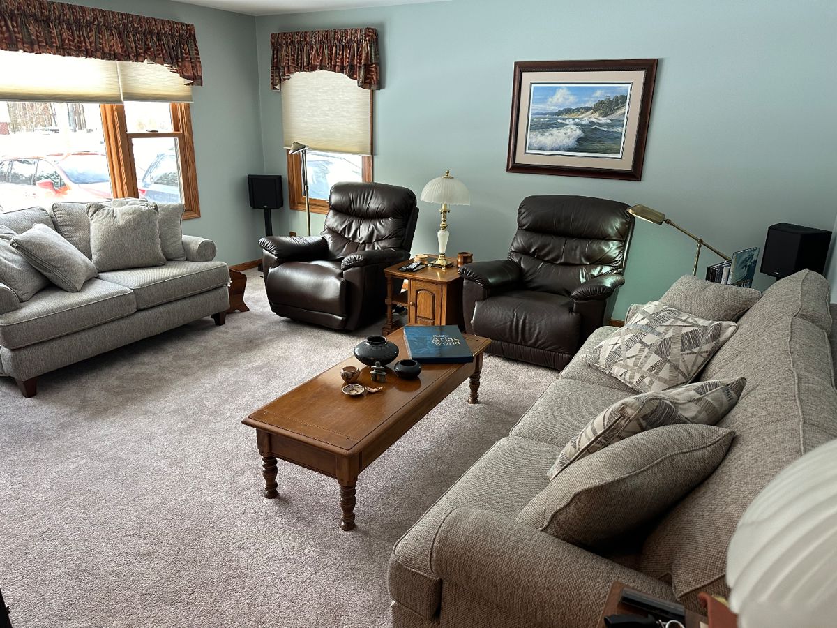 Living room view - leather chairs and like new couch/loveseat