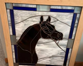 Stained glass art of a horse