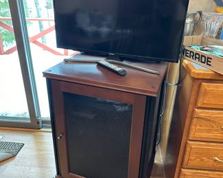 32” TV and stereo cabinet on wheels