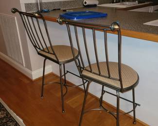 Pair of heavy iron barstools