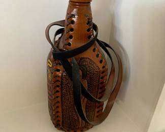 vintage leather wrapped bottle flask
