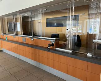 bullet proof glass windows and bank or drug store counter