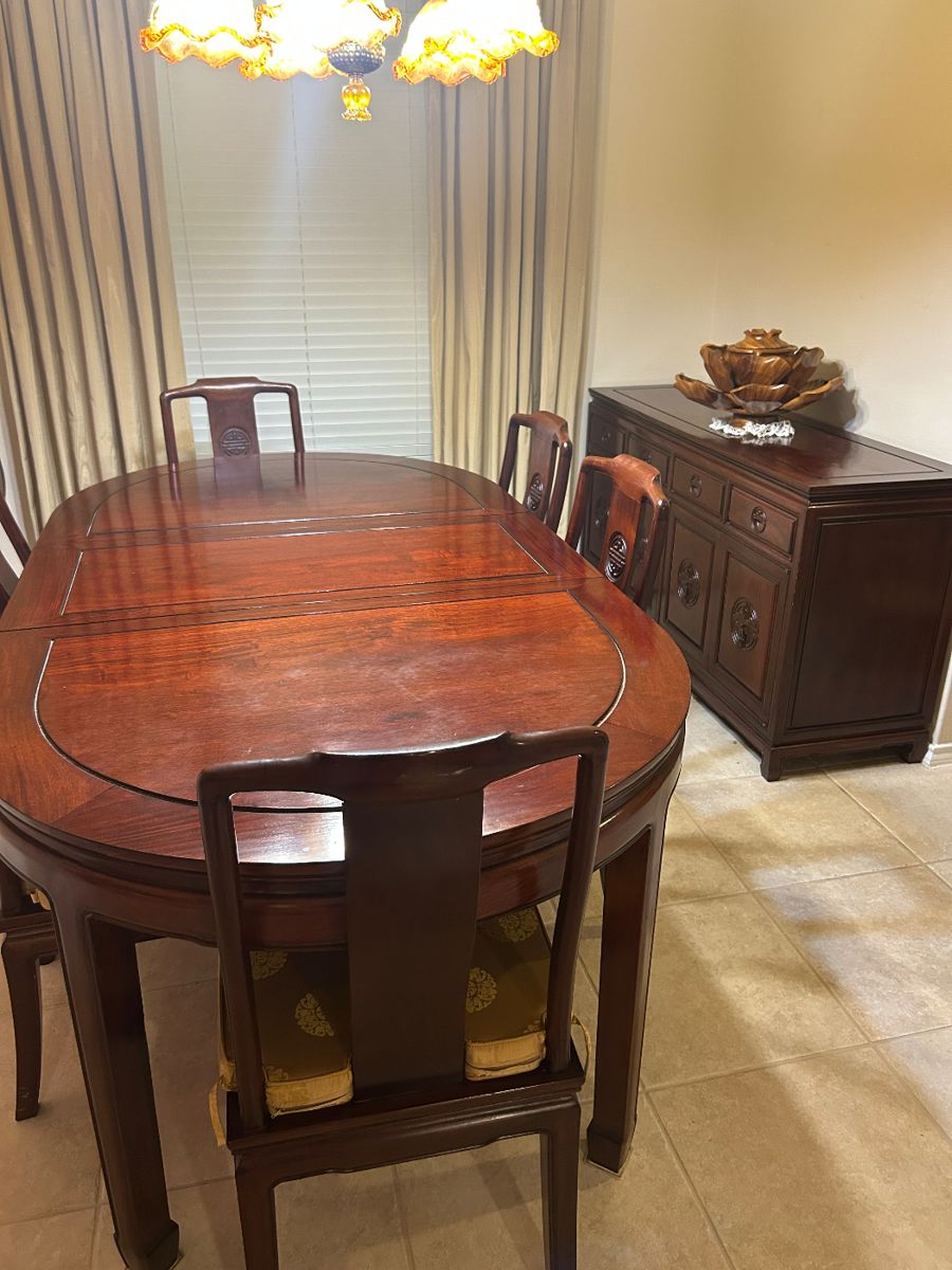 Rosewood dining table with extra leaf