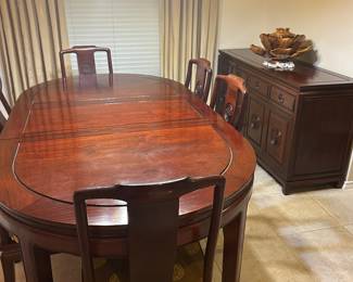 Rosewood dining table with extra leaf