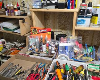 Attic workroom has lots of tools.  Owner repaired vintage reel-to-reel machines.  