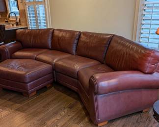 Havertys leather curved sofa with ottoman 