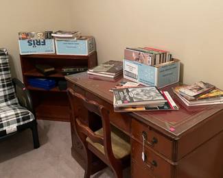 Sofa Futon Bed, Assorted Books, CD's, DVD's, Cassette Tapes, VHS Tapes, Books on Tape, Bookcases, Antique Desk with Chair
