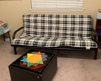 Sofa Futon Bed, Blanket Storage Table with Serving Tray, Assorted Books, CD's, DVD's, Cassette Tapes, VHS Tapes, Books on Tape, Bookcases, Antique Desk with Chair