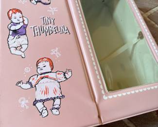 Tiny Thumbeline case and doll wind up moves