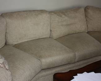 Concave tan fabric couch  no stains/rips/snags