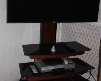 Sony flat screen w/3 tier black acrylic stand 