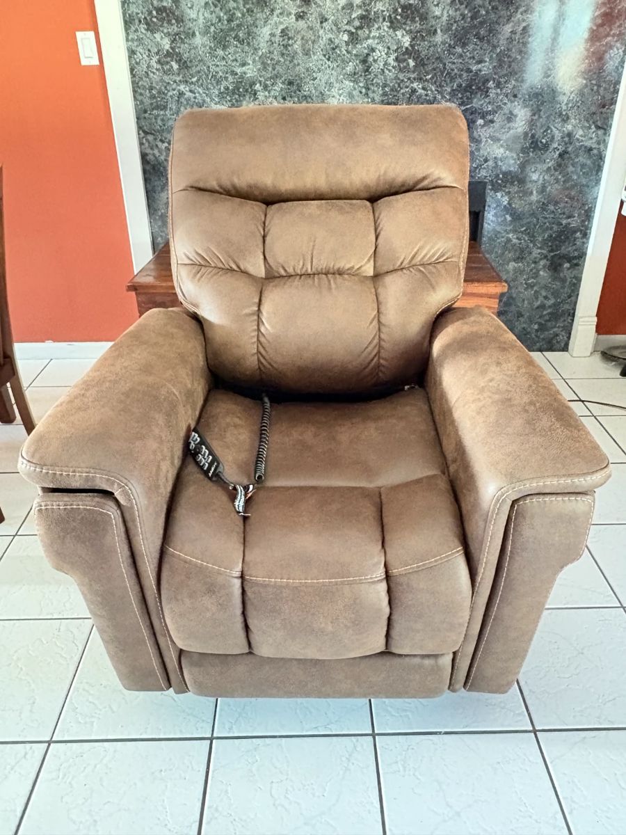VivaLift Radiance electric lift chair - model PLR3955S, weight limit 400#, used only 5 months, has cup holder and charging station for cell phone, built in heating in lumbar area. Chair weight 156#