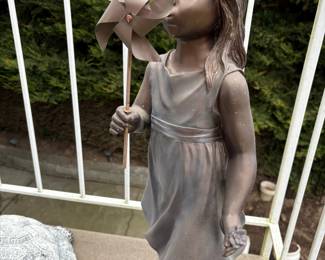 Bronze-Style Statue of a Girl with a Pinwheel