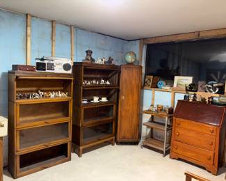 Bookshelves (glass broken in a few covers. Secretary, dog, knickknacks, animal knickknacks