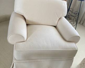 There are 2 of these comfy arm chairs