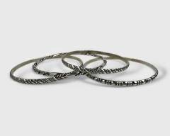Set of 4 Sterling Silver Bangle Bracelets.
