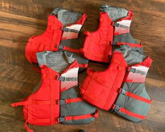 Stohlquist adult life jackets.  We also have some kid's life jackets by a different manufacturer.