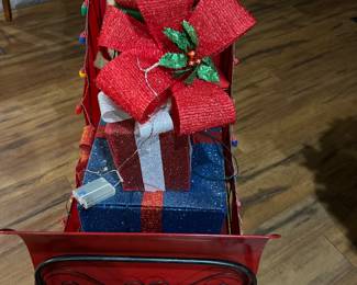 Metal sleigh and packages $150.00