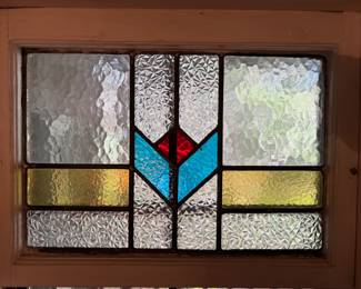 Stain glass window 23”w 17.5” t.  
$ 250.00