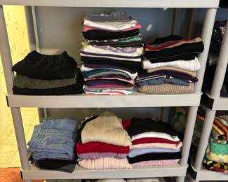 Linen and clothes, sheets, towels, blankets, shower curtains, comforter and pillows.