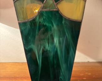 Stained glass vase. 10.5”t 6”w 3.5” d 3”base 
$ 30.00