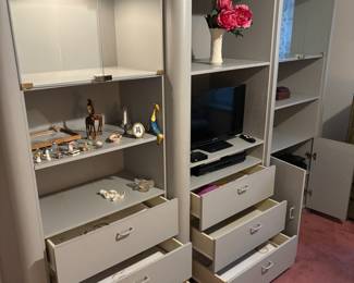 3 piece Grey laminate Wall Unit lighted.
End units.  32.5”w 18” d 77.5”t Center 36”w 22”d 77.5”t.      $ 600.00